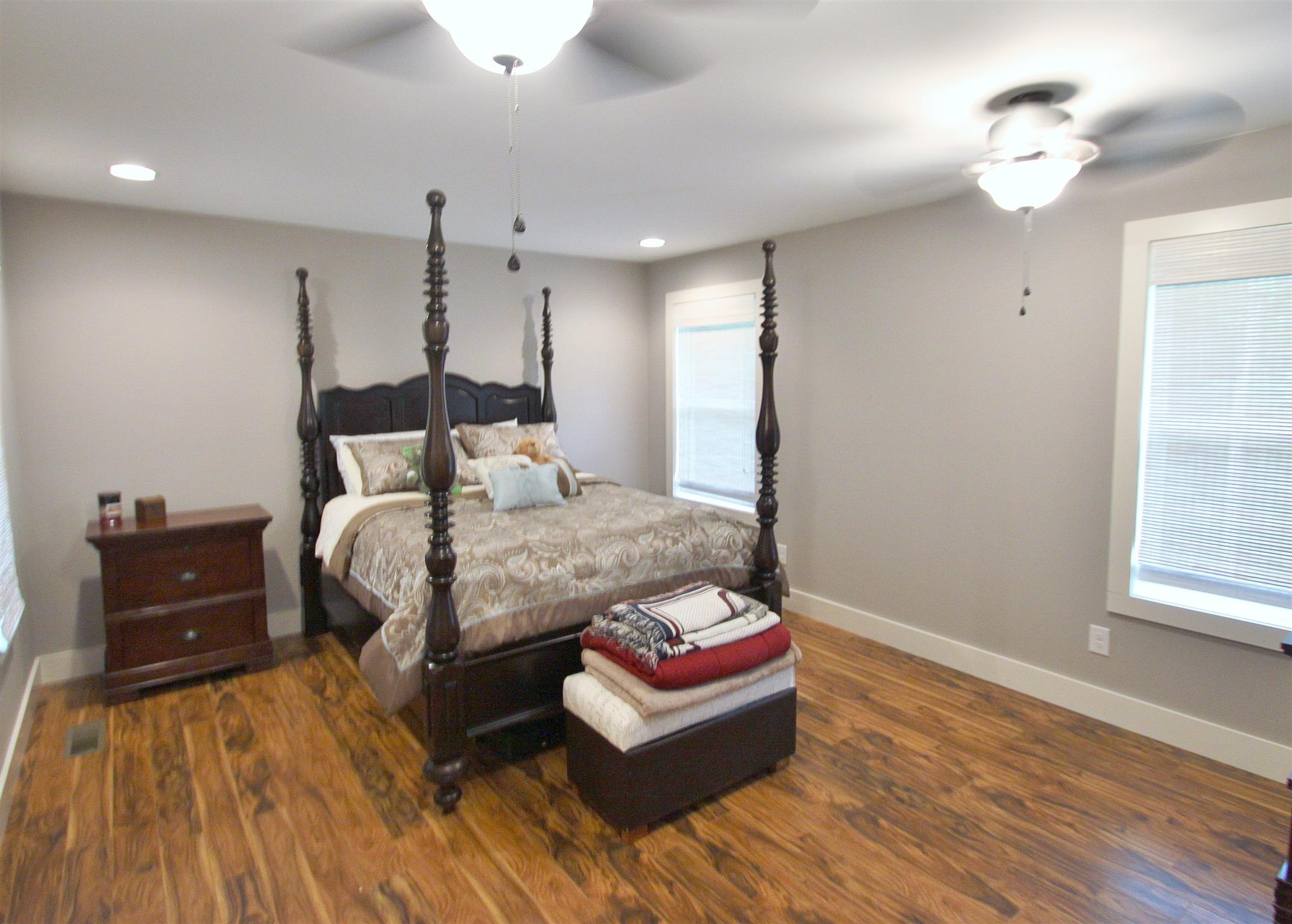 54 Snow Tree Bend Manchester, TN 37355 - Photo 8 of 16 a bedroom with a bed and wooden floor