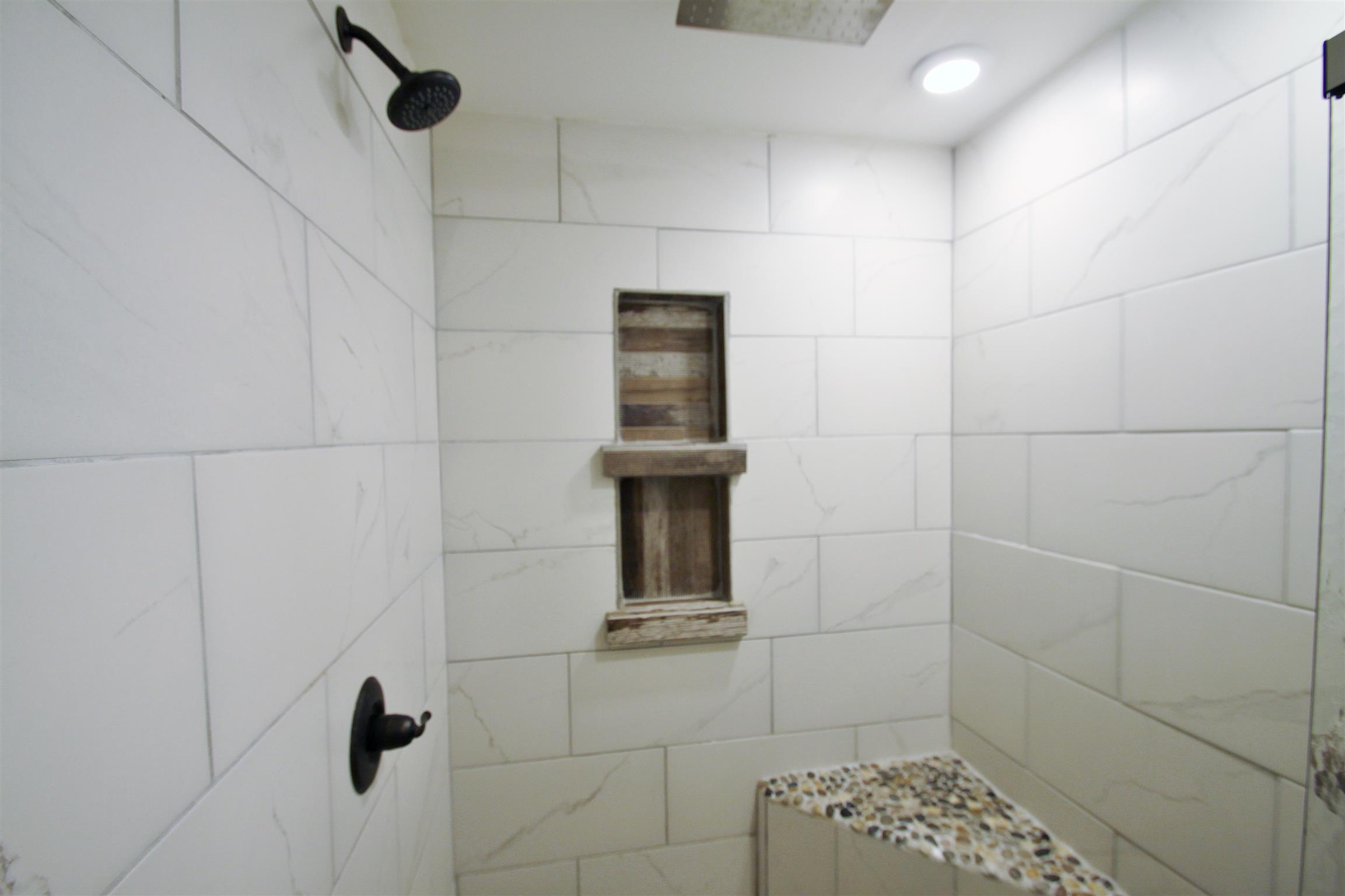54 Snow Tree Bend Manchester, TN 37355 - Photo 10 of 16 a bathroom with a shower