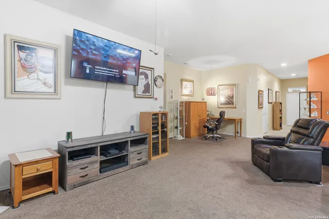 a view of a livingroom with furniture and a couch