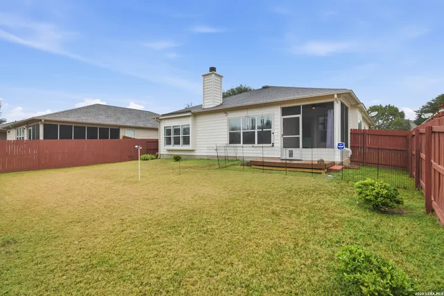 a front view of a house with swimming pool