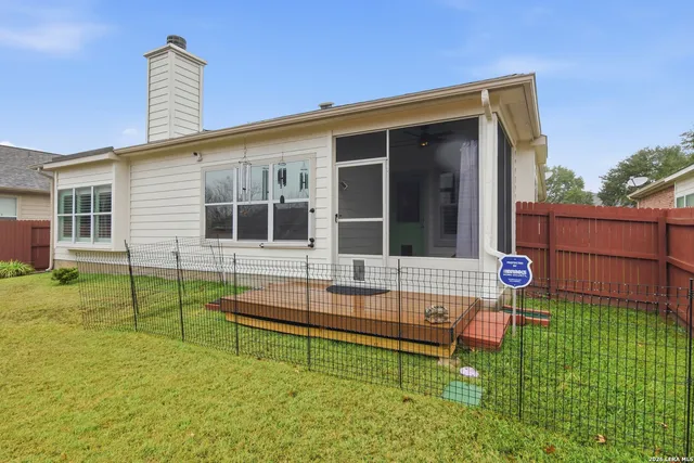 a house view with a garden space