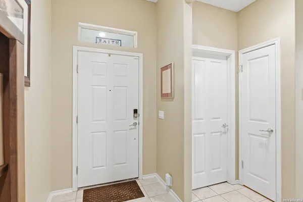 a view of a hallway with closet area