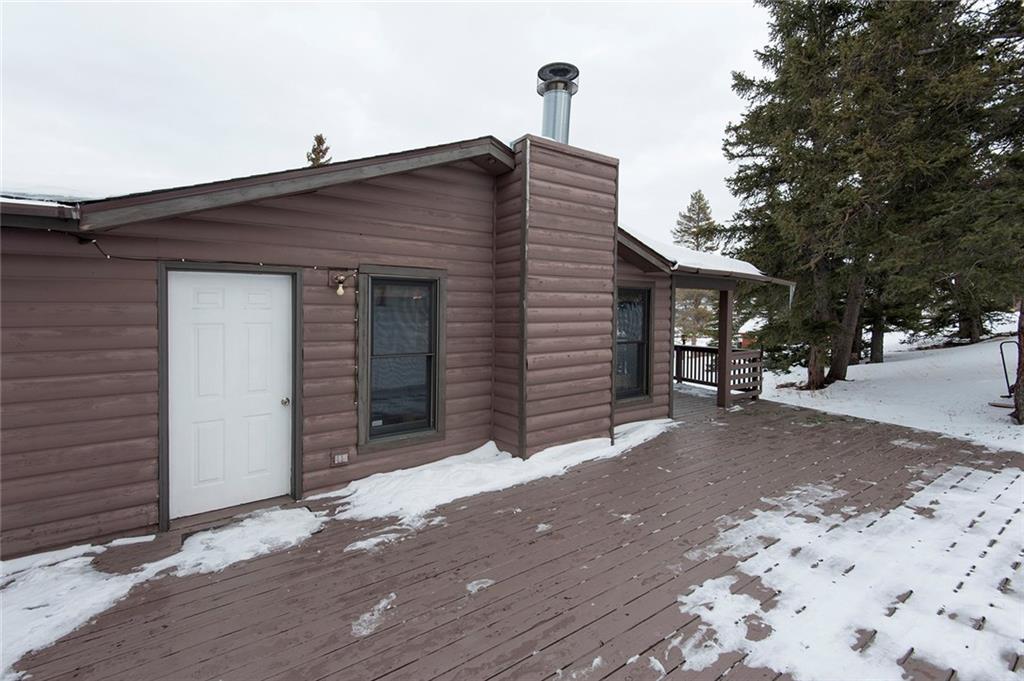 76 Lakeside Drive Dillon, CO 80435 - Photo 13 of 23 a front view of a house with a yard and garage