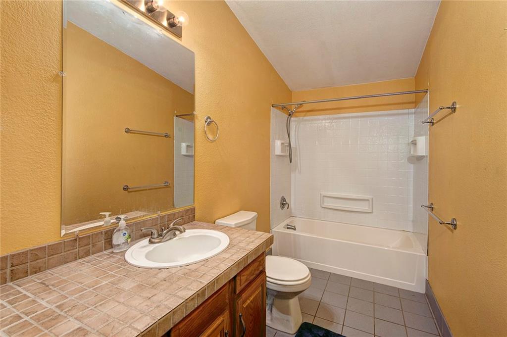 76 Lakeside Drive Dillon, CO 80435 - Photo 21 of 23 a bathroom with a sink a toilet and shower
