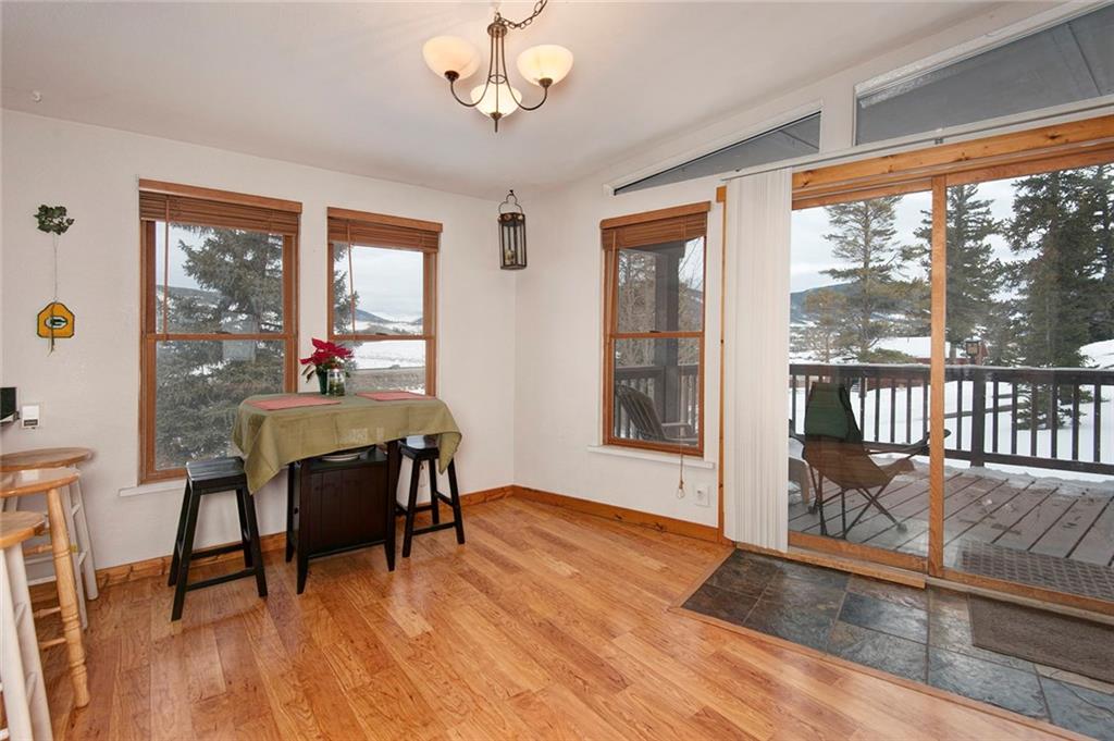 76 Lakeside Drive Dillon, CO 80435 - Photo 8 of 23 a view of a dining room with furniture window and wooden floor