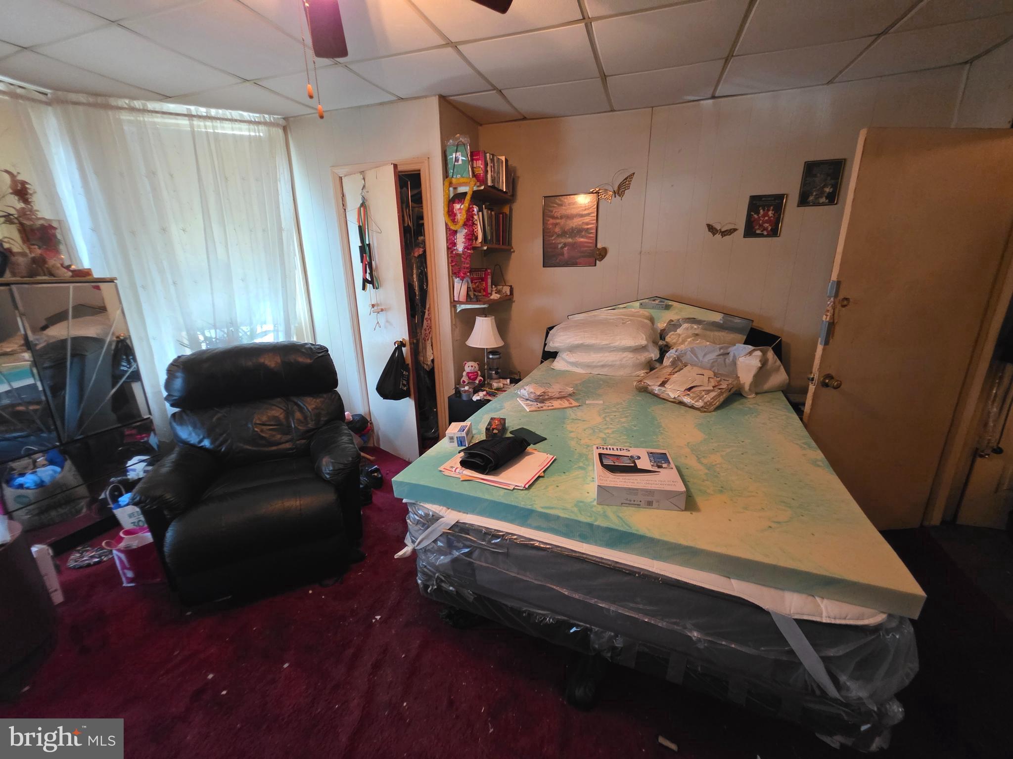 1317 East Rittenhouse Street Philadelphia, PA 19138 - Photo 11 of 16 a bedroom with furniture and a bed
