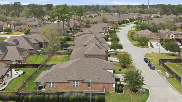 an aerial view of a house with a garden
