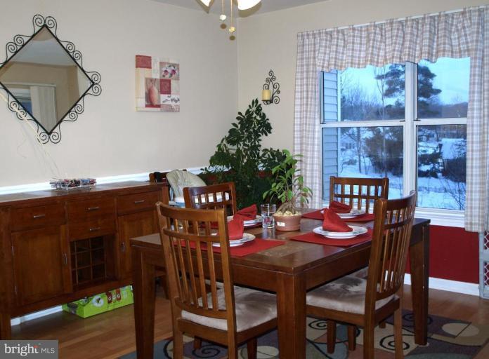 6 Fallen Tree Court, Unit 6E Halethorpe, MD 21227 - Photo 5 of 13 Dining area with view