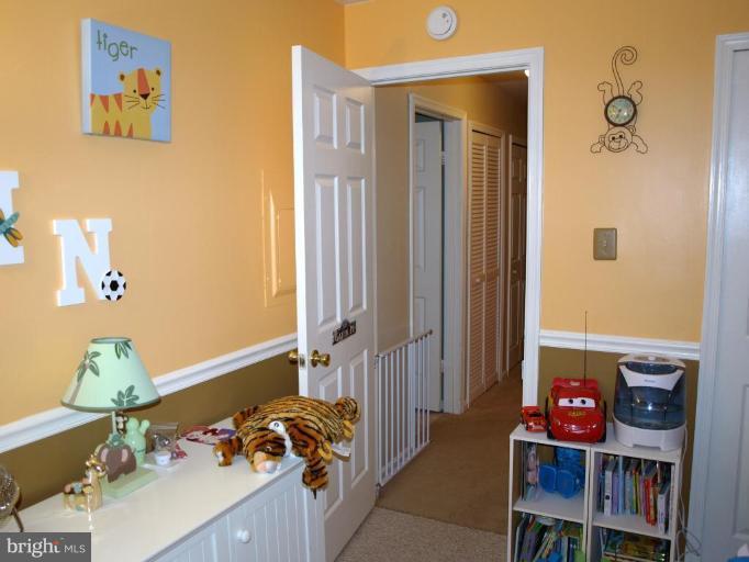 6 Fallen Tree Court, Unit 6E Halethorpe, MD 21227 - Photo 10 of 13 Bedroom 2 living to Hallway