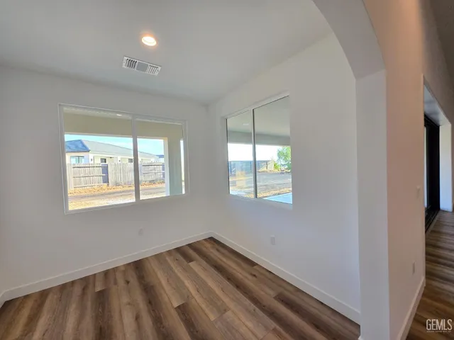 an empty room with windows