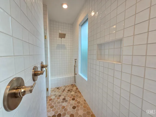 a bathroom with a sink and mirror