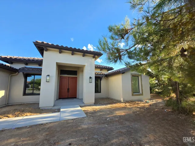a view of a house with a garage