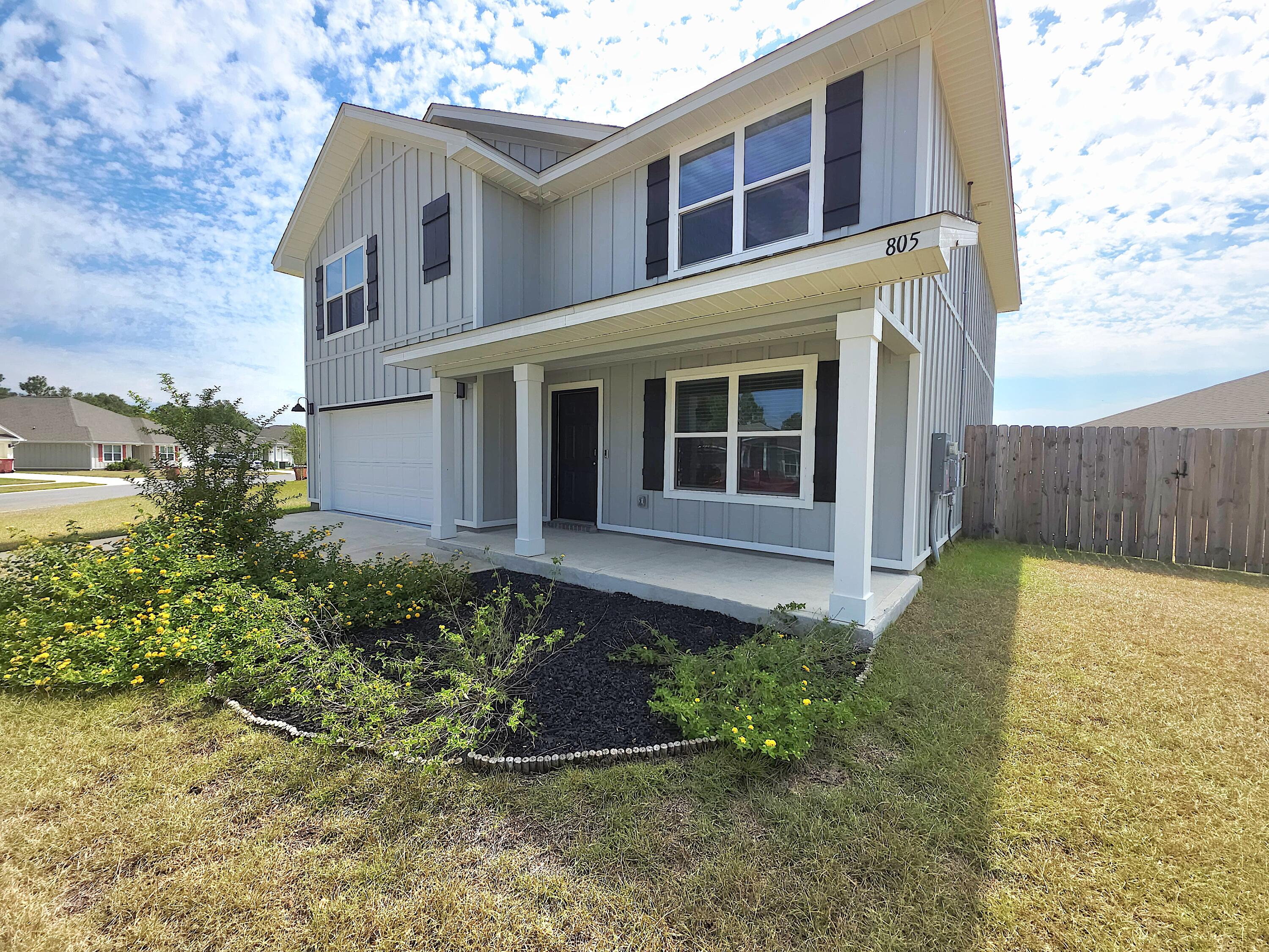 805 Otto Loop Crestview, FL 32539 - Photo 1 of 32 front view of a house with a yard