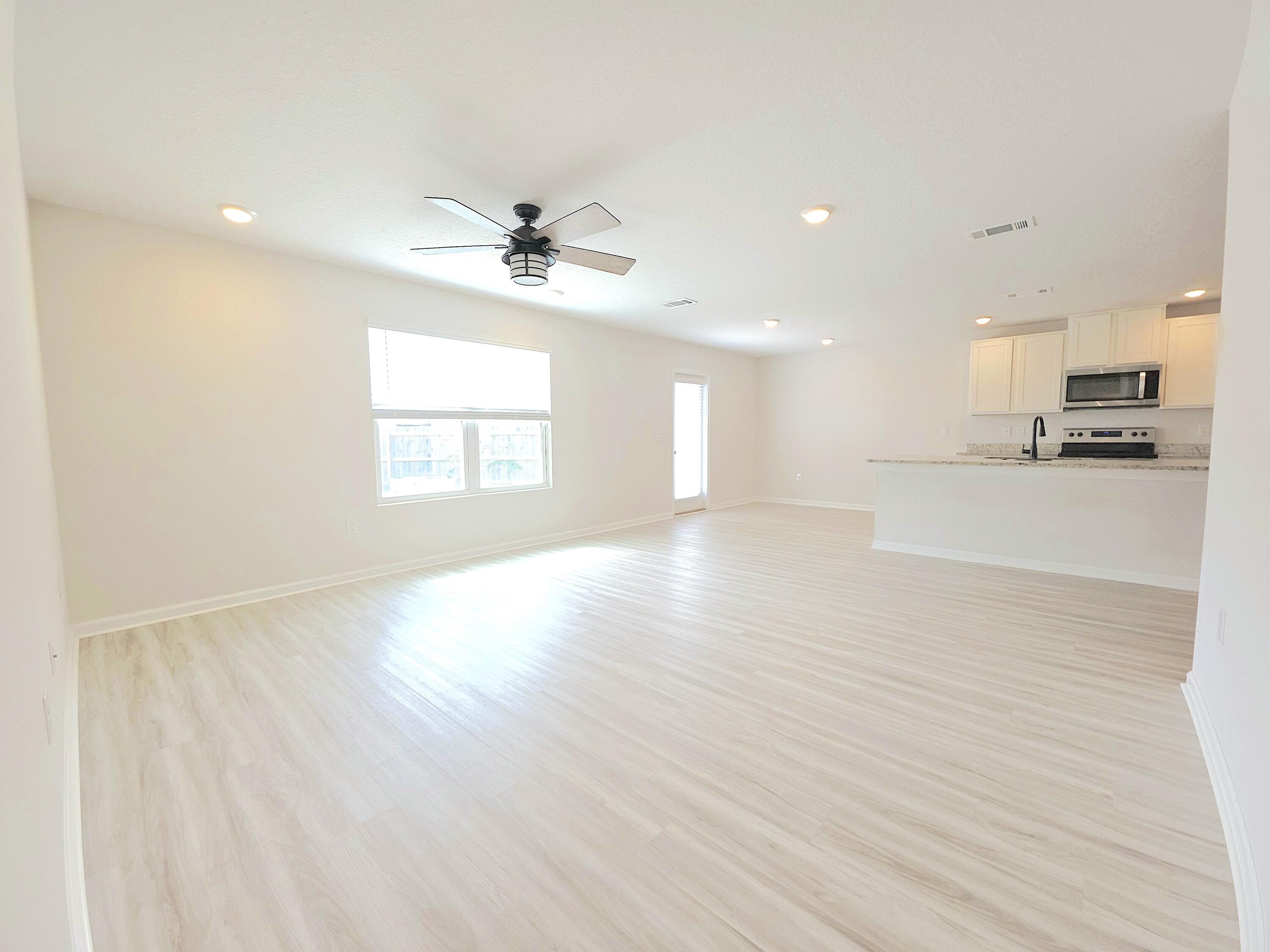 805 Otto Loop Crestview, FL 32539 - Photo 14 of 32 a view of an empty room with a window