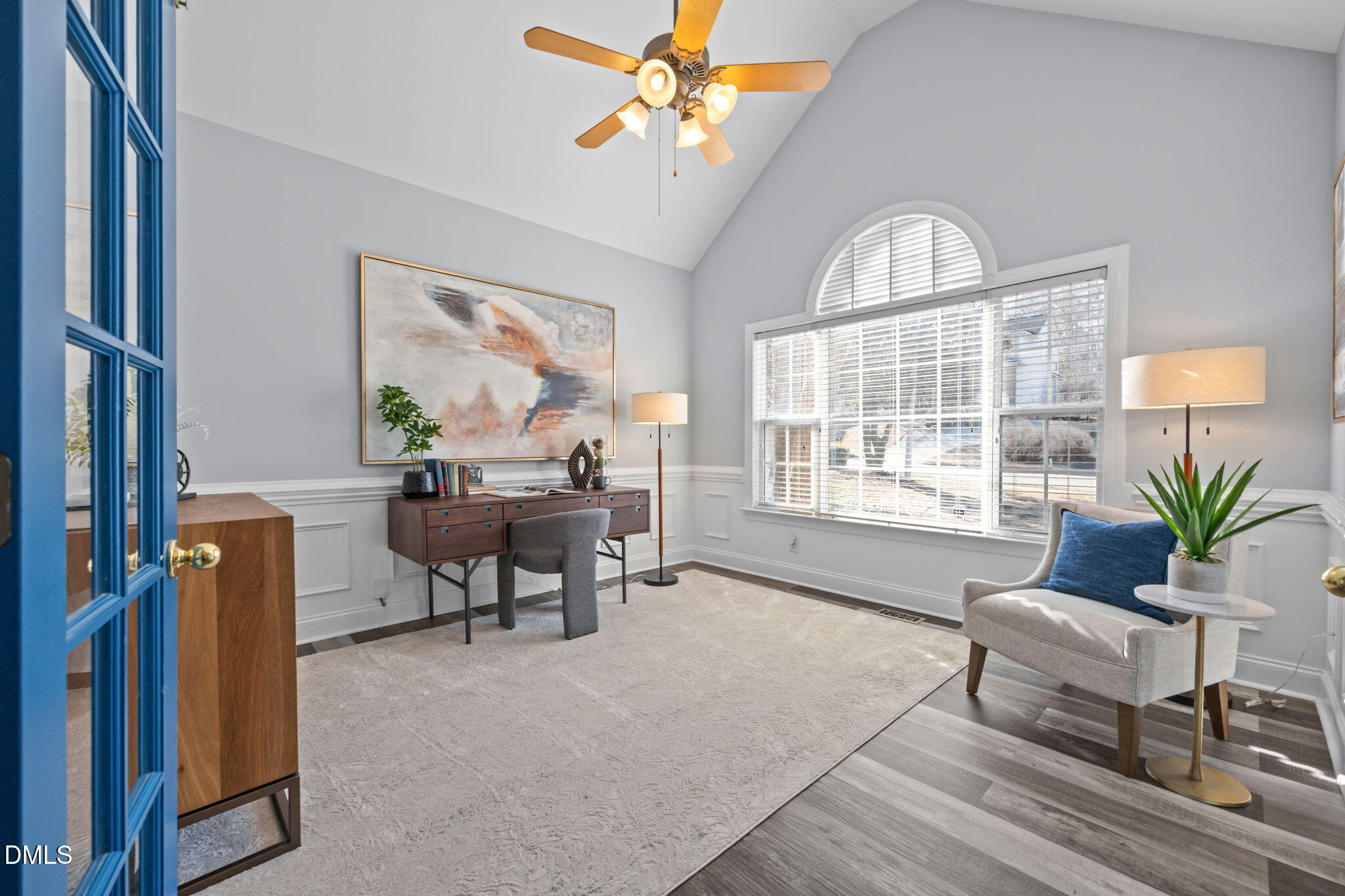 450 Seastone Street Raleigh, NC 27603 - Photo 11 of 47 a living room with furniture a chandelier and a window