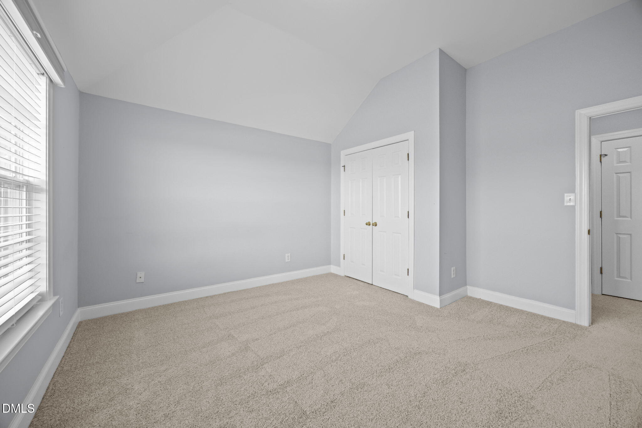 450 Seastone Street Raleigh, NC 27603 - Photo 19 of 47 a view of an empty room with a window