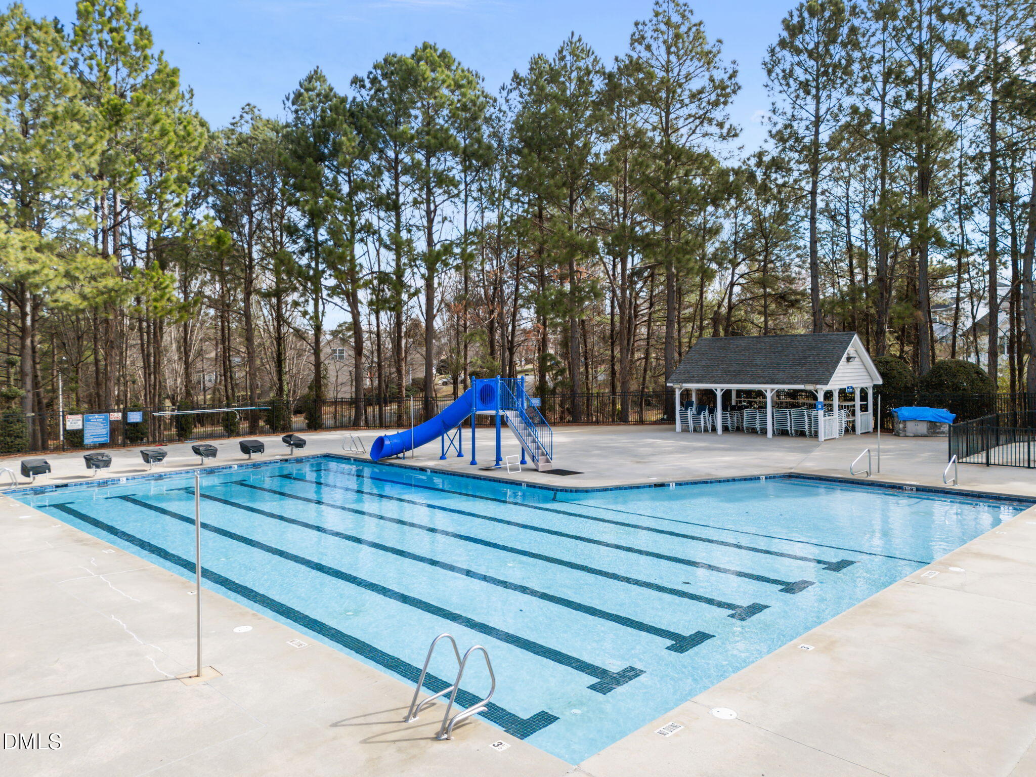 450 Seastone Street Raleigh, NC 27603 - Photo 36 of 47 a view of pool with umbrella and trees