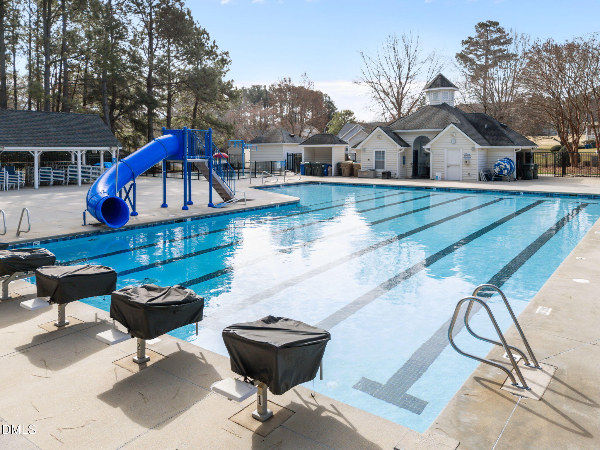 450 Seastone Street Raleigh, NC 27603 - Photo 37 of 47 a view of a house with swimming pool and sitting area