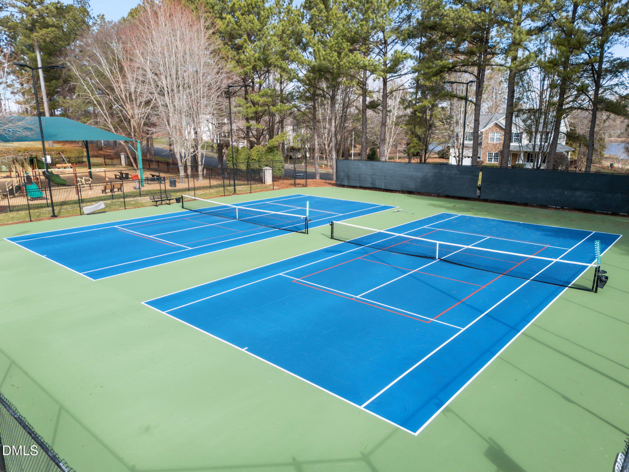 450 Seastone Street Raleigh, NC 27603 - Photo 39 of 47 a view of outdoor space and tennis court