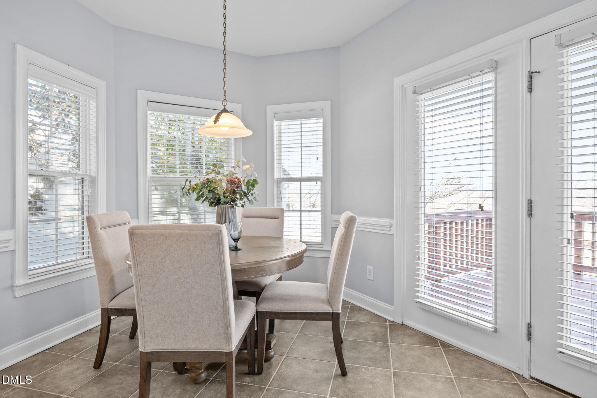 450 Seastone Street Raleigh, NC 27603 - Photo 7 of 47 a dining room with furniture and window