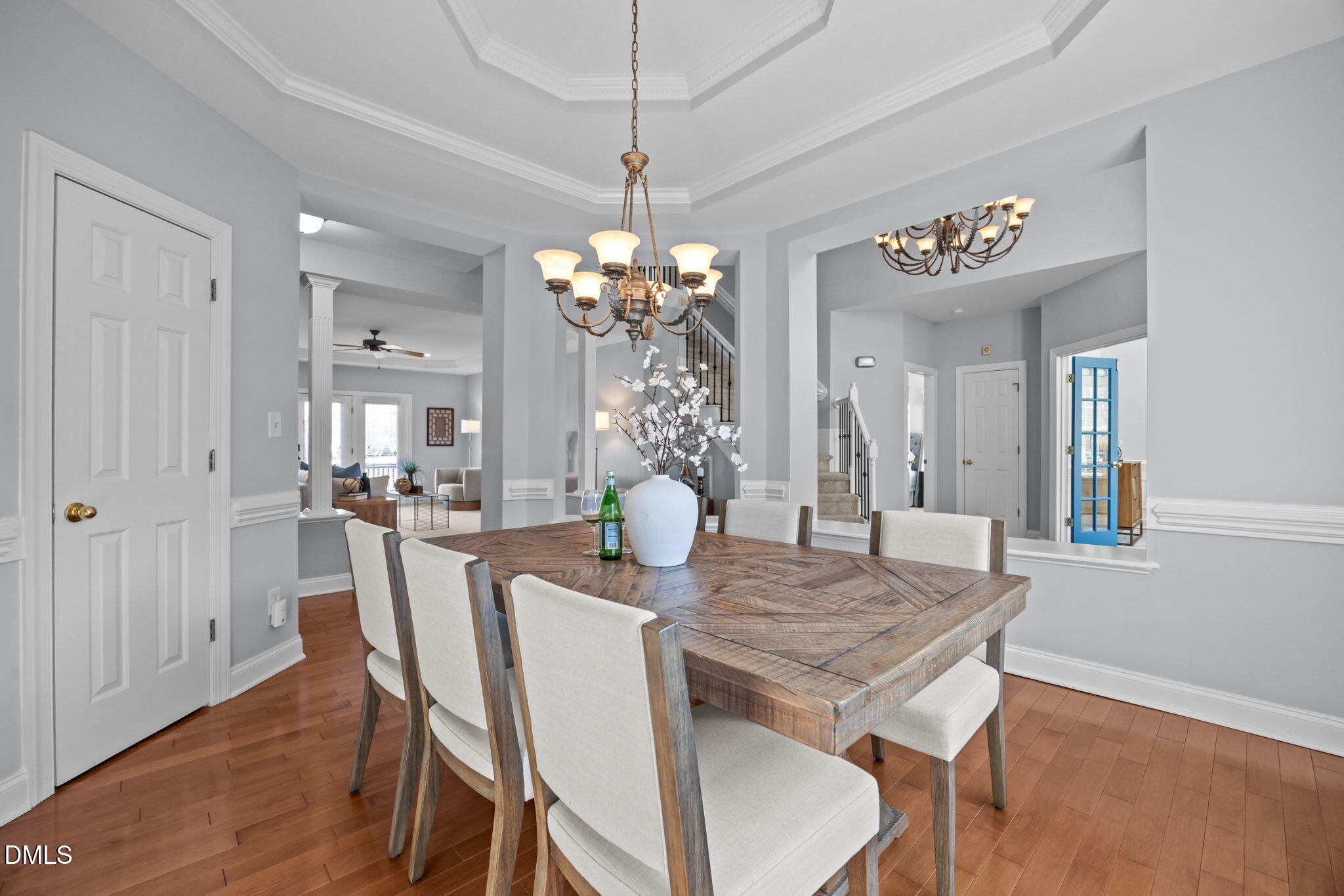 450 Seastone Street Raleigh, NC 27603 - Photo 9 of 47 a view of a dining room with furniture and wooden floor