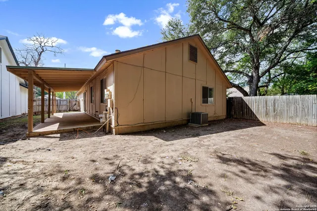a view of backyard with green space