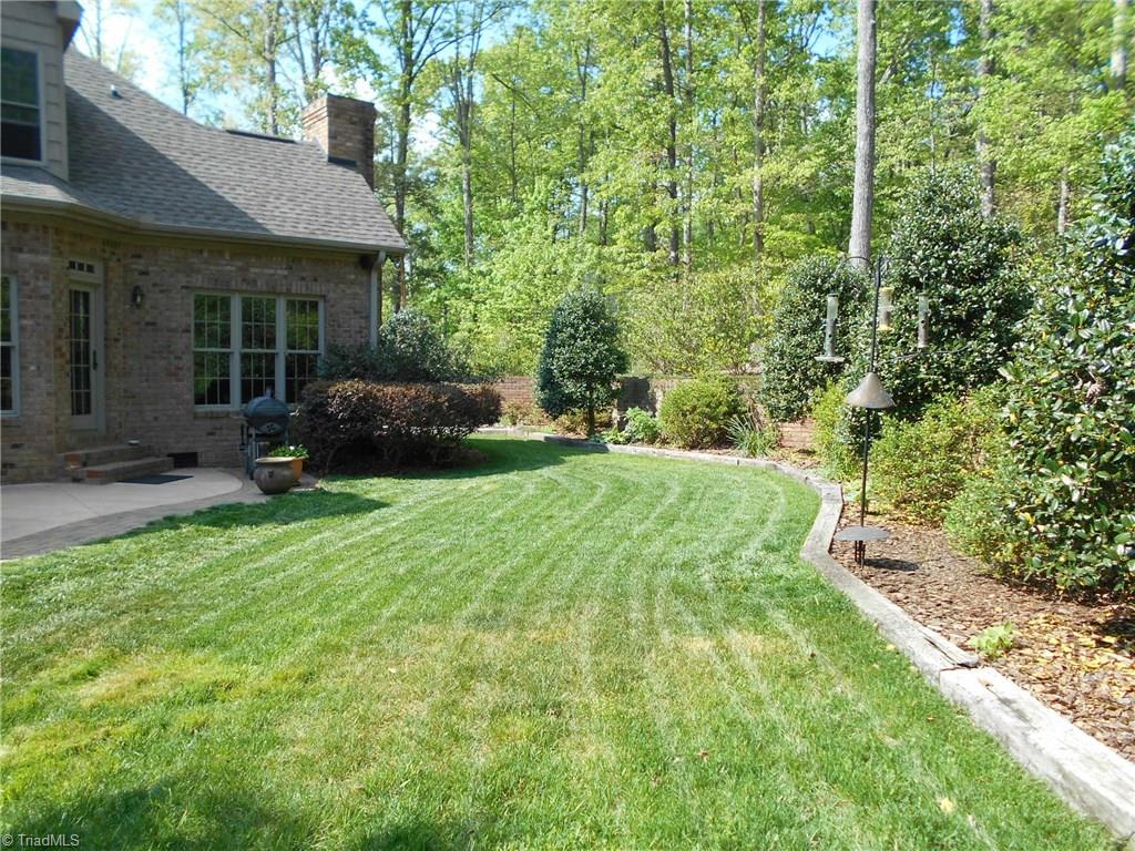 5044 Bennington Way High Point, NC 27262 - Photo 28 of 28 Back yard with mature landscaping