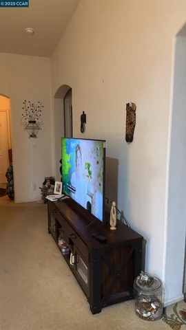 a room with furniture and air hockey table