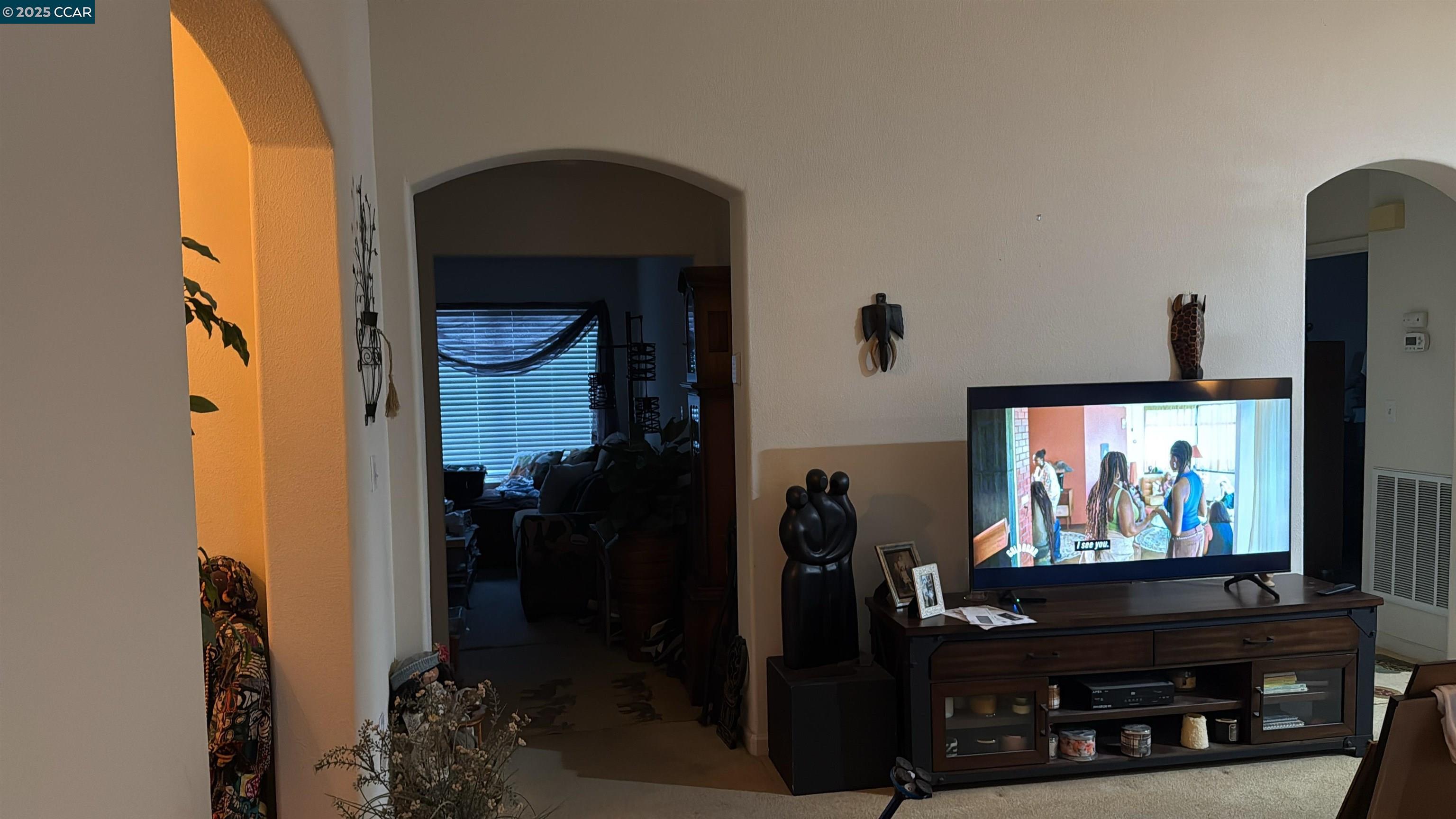 307 Crystal Downs Drive Rio Vista, CA 94571 - Photo 3 of 38 a living room with furniture and a flat screen tv