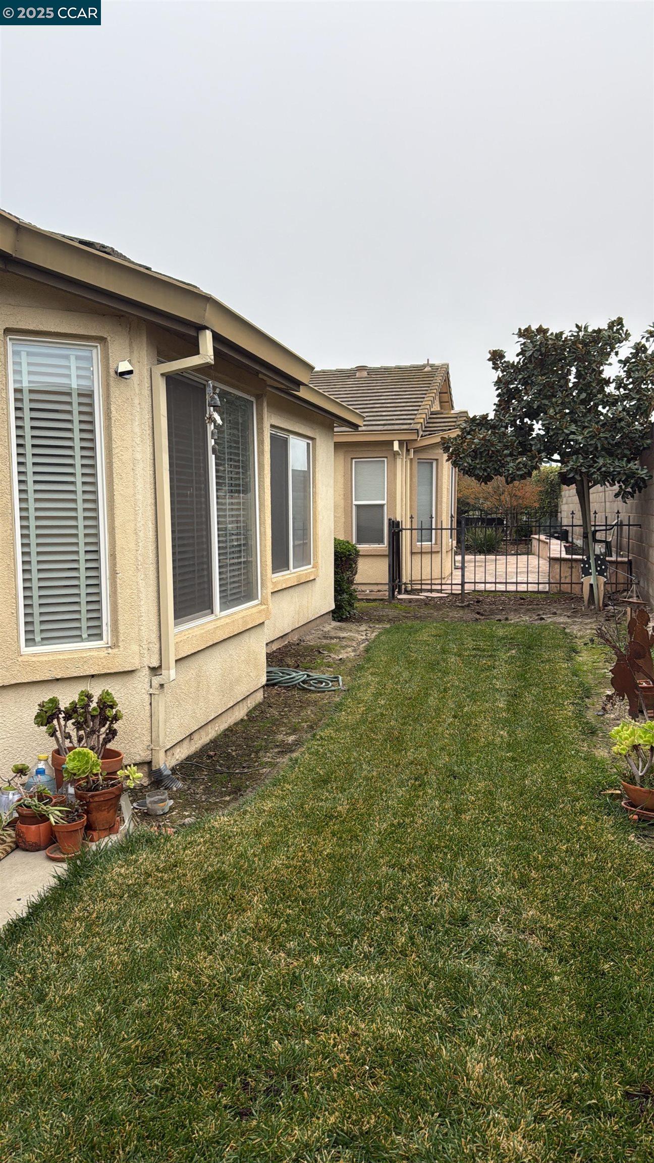 307 Crystal Downs Drive Rio Vista, CA 94571 - Photo 31 of 38 a house with garden in front of it