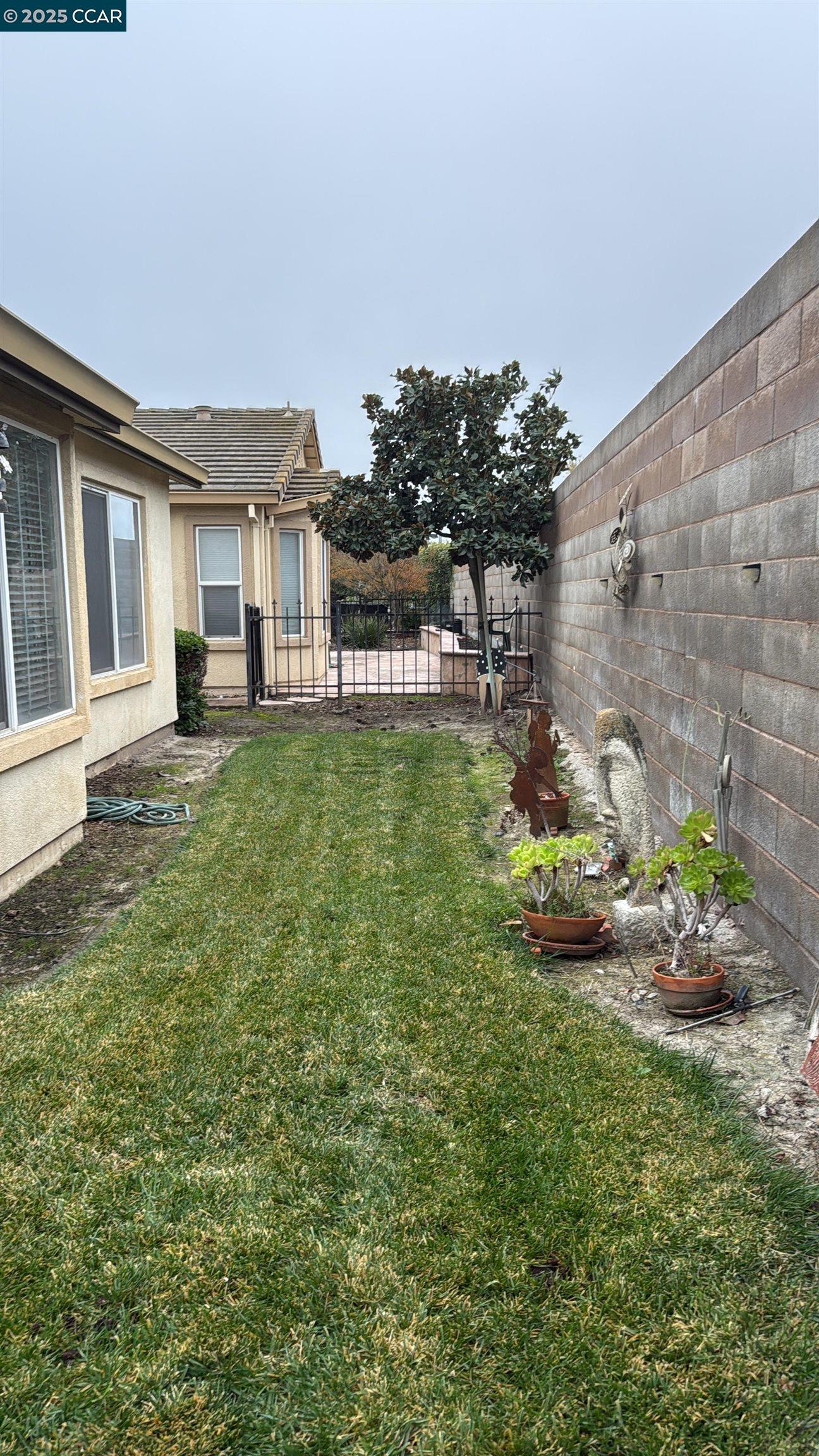 307 Crystal Downs Drive Rio Vista, CA 94571 - Photo 32 of 38 a front view of a house with garden
