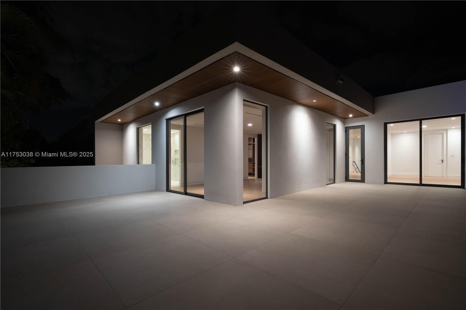 215 Shore Drive South Miami, FL 33133 - Photo 19 of 26 a view of an empty room with window and fireplace