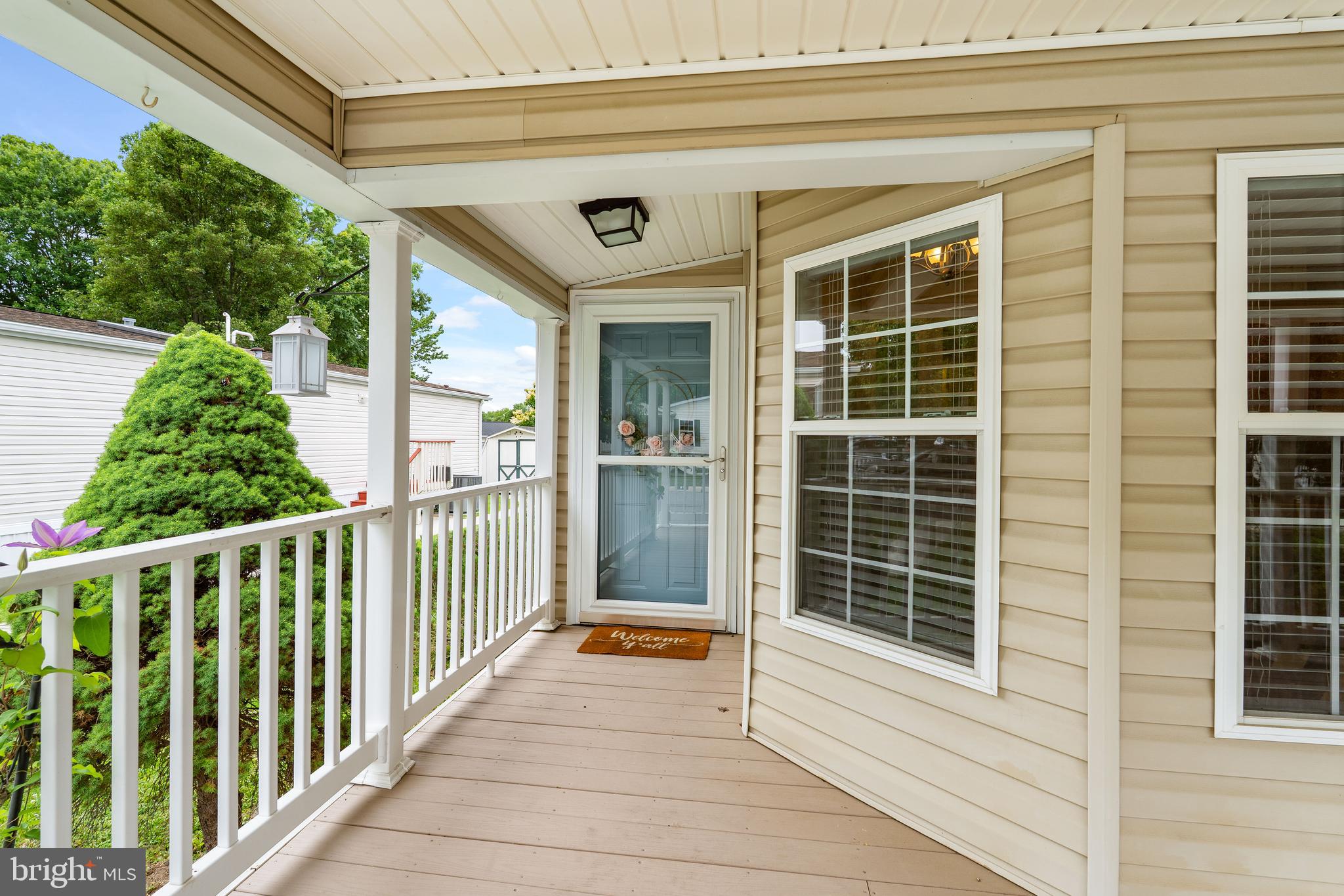 77 Woods Way Elkton, MD 21921 - Photo 5 of 31 STORM DOOR PROVIDES NATURAL LIGHT