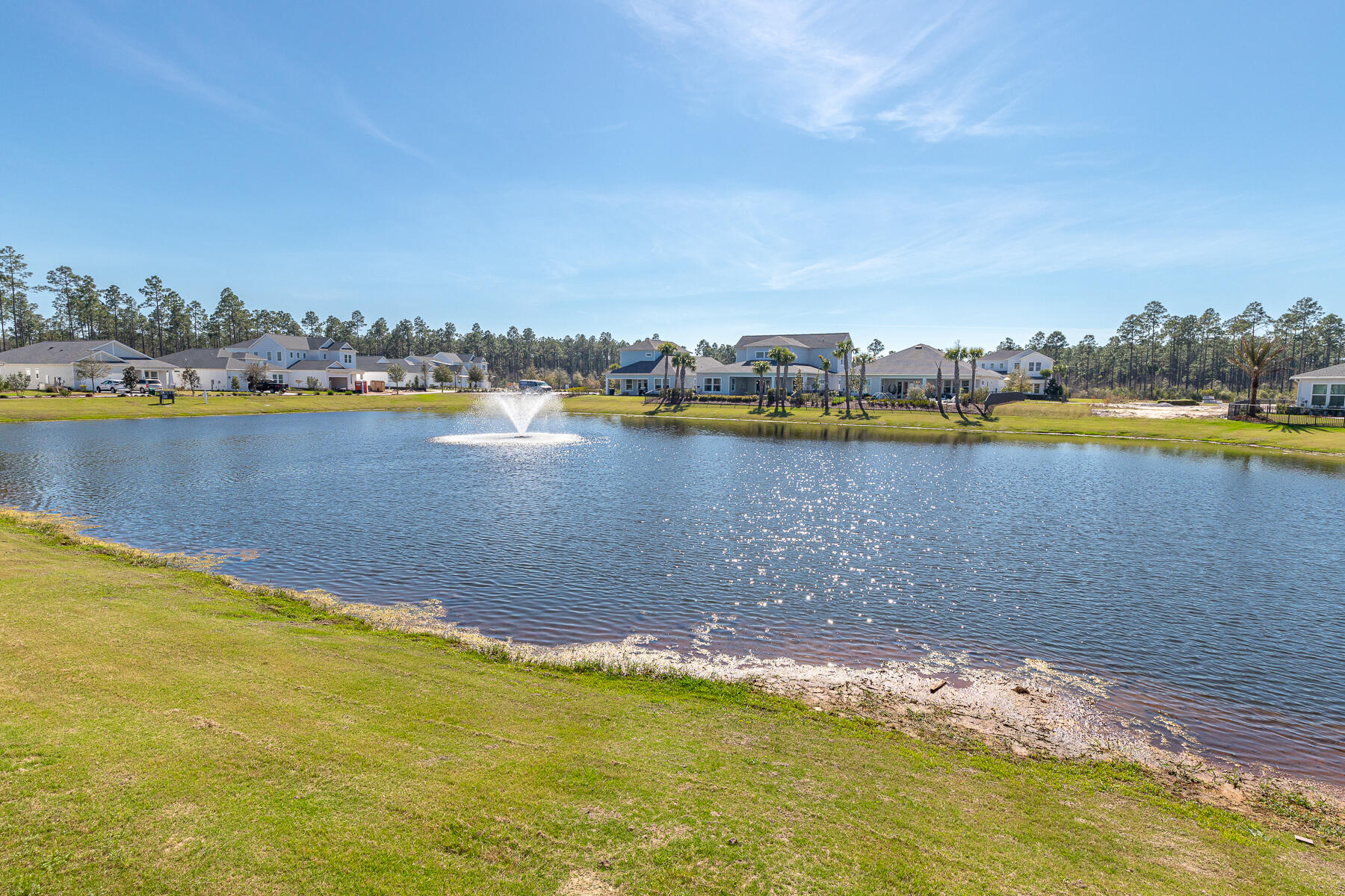 61 West Lafayette Rd Inlet Beach Inlet Beach, FL 32461 - Photo 45 of 76 a view of a lake with boats and trees in the background