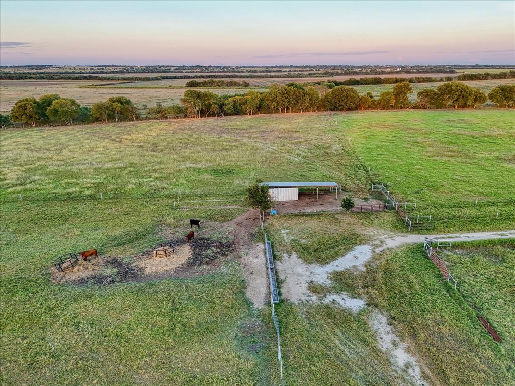 6630 Spring Valley Road Lorena, TX 76655 - Photo 13 of 23 a view of a lake with houses in the back