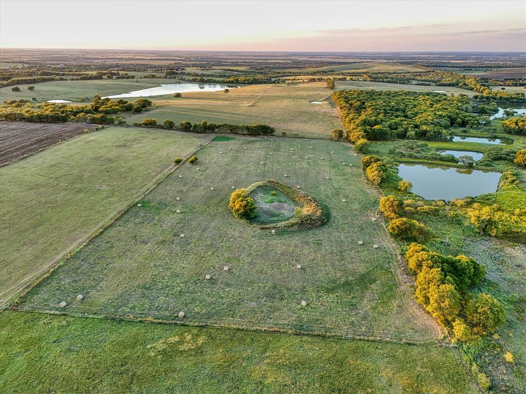 6630 Spring Valley Road Lorena, TX 76655 - Photo 20 of 23 a view of a lake with a city