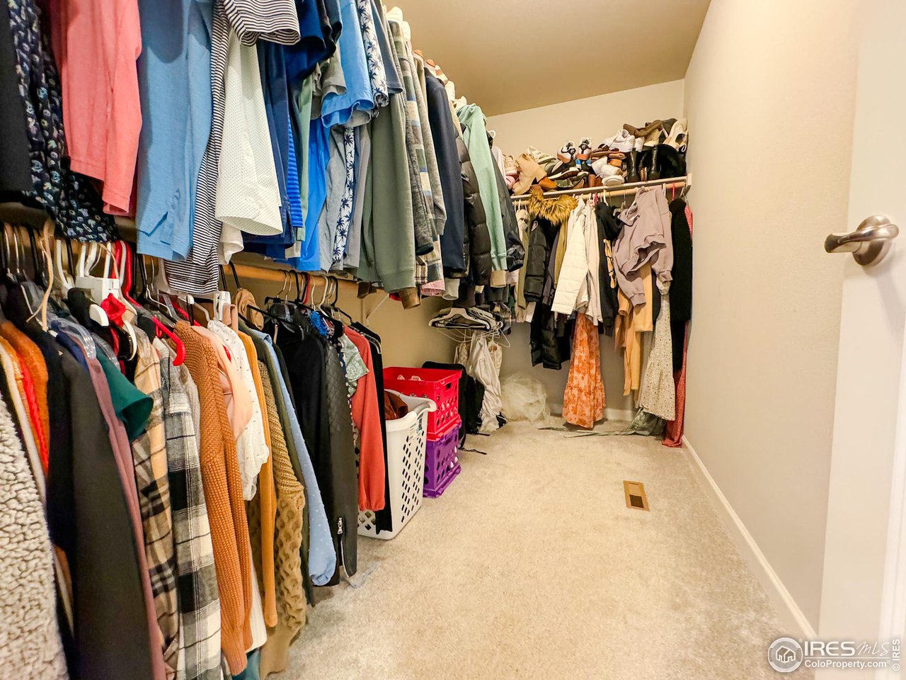 531 Ranchhand Drive Berthoud, CO 80513 - Photo 16 of 34 a view of walk in closet with clothes