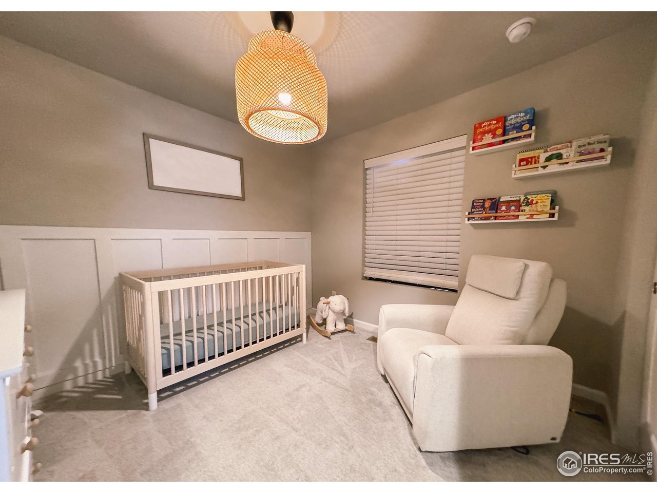 531 Ranchhand Drive Berthoud, CO 80513 - Photo 17 of 34 a bedroom with furniture and a window