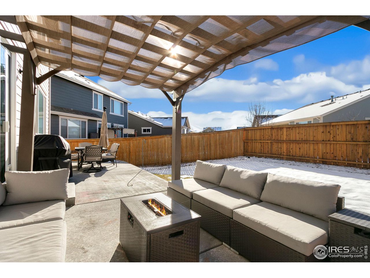 531 Ranchhand Drive Berthoud, CO 80513 - Photo 22 of 34 a view of a patio with couches and potted plants