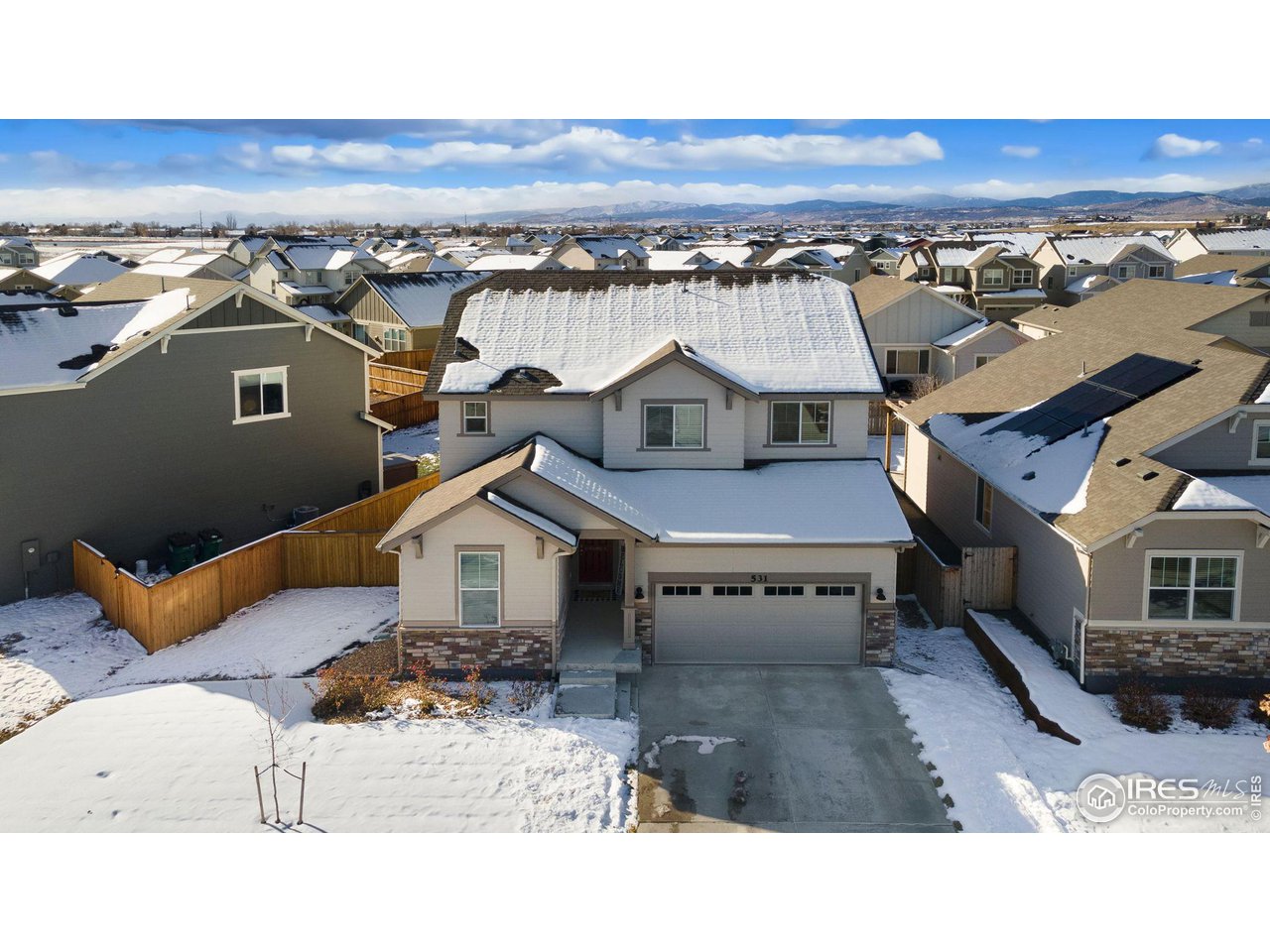 531 Ranchhand Drive Berthoud, CO 80513 - Photo 3 of 34 an aerial view of a house with a yard swimming pool and outdoor seating