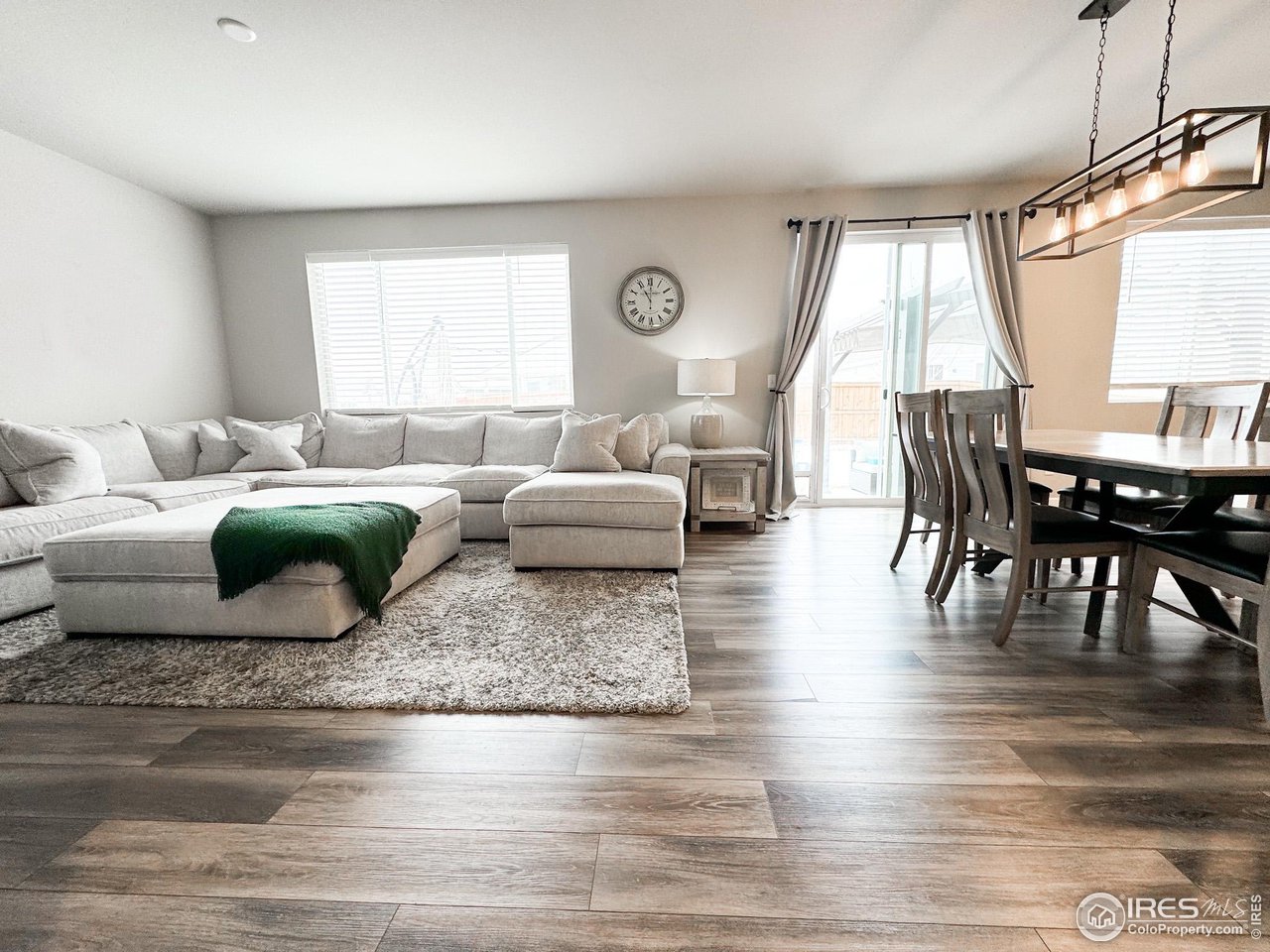 531 Ranchhand Drive Berthoud, CO 80513 - Photo 4 of 34 a living room with furniture and a large window