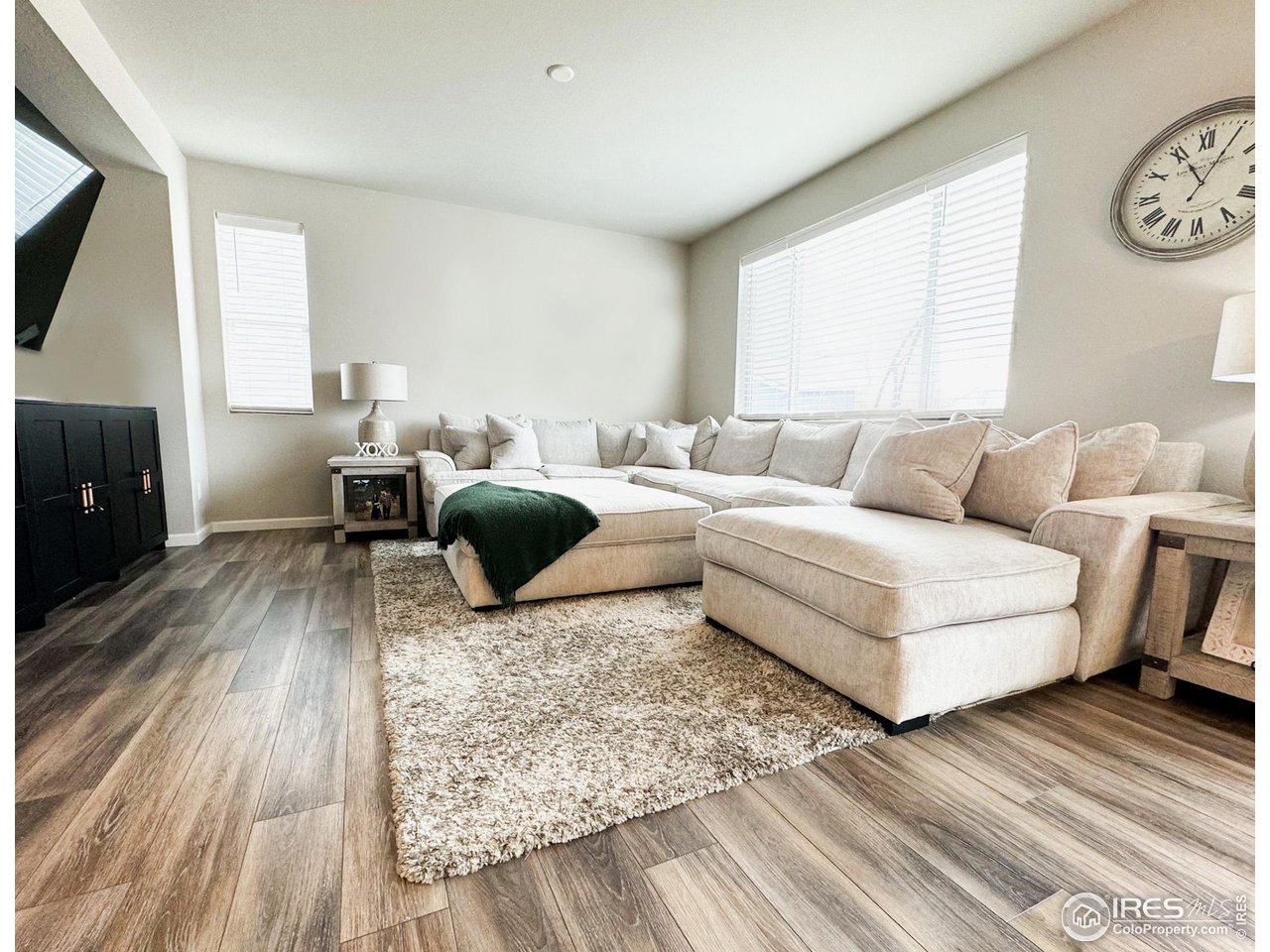 531 Ranchhand Drive Berthoud, CO 80513 - Photo 5 of 34 a living room with furniture and a large window