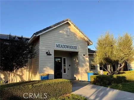 a view of a chairs and table in the patio