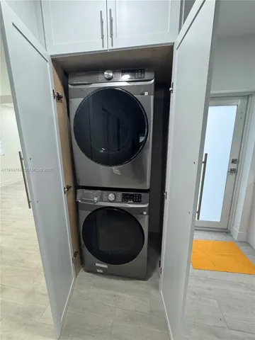 a close view of a washer and dryer in a utility room