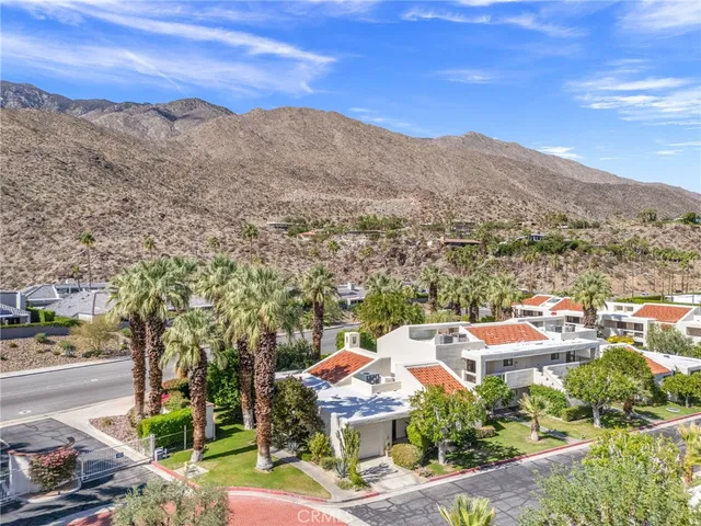 a view of a city with mountains in the background
