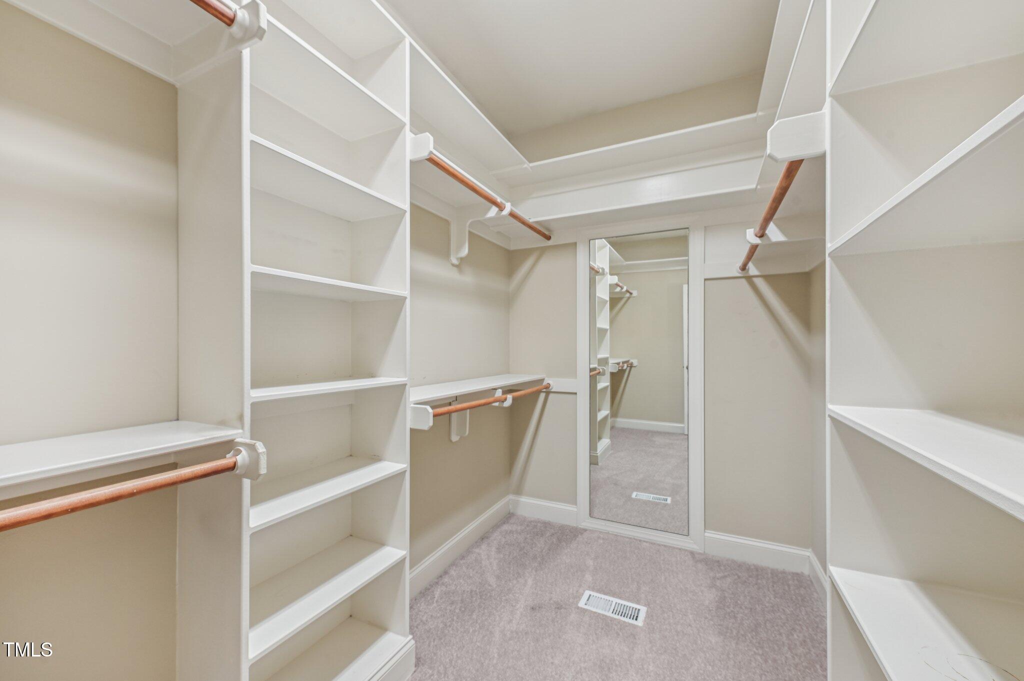 75 Crestline Drive Selma, NC 27576 - Photo 15 of 31 a view of an empty walk in closet