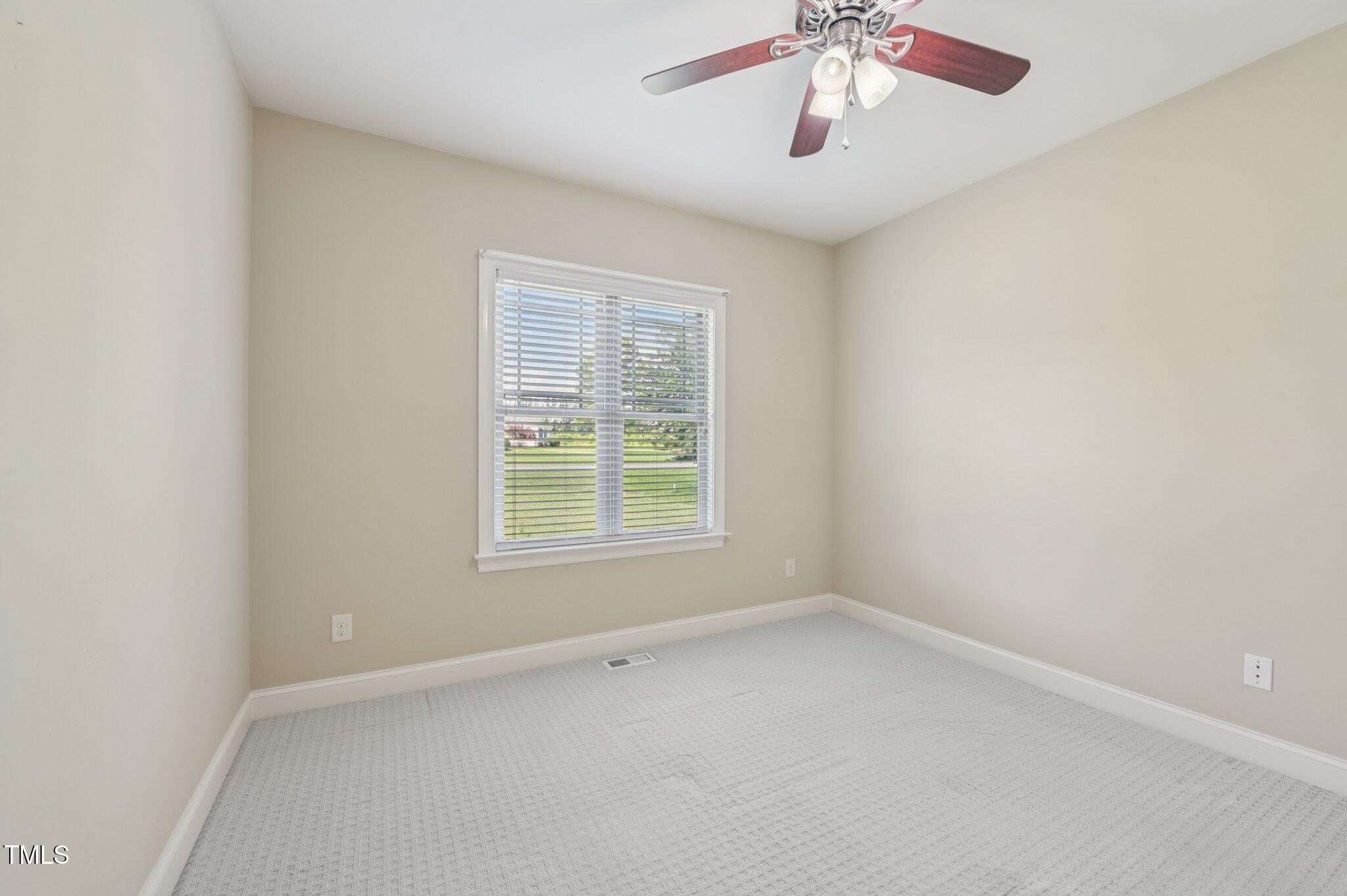 75 Crestline Drive Selma, NC 27576 - Photo 22 of 31 an empty room with a window