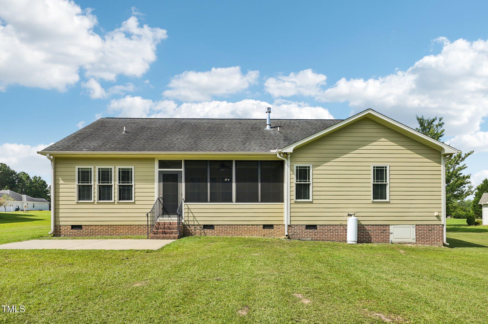 75 Crestline Drive Selma, NC 27576 - Photo 27 of 31 a view of a house with yard and porch