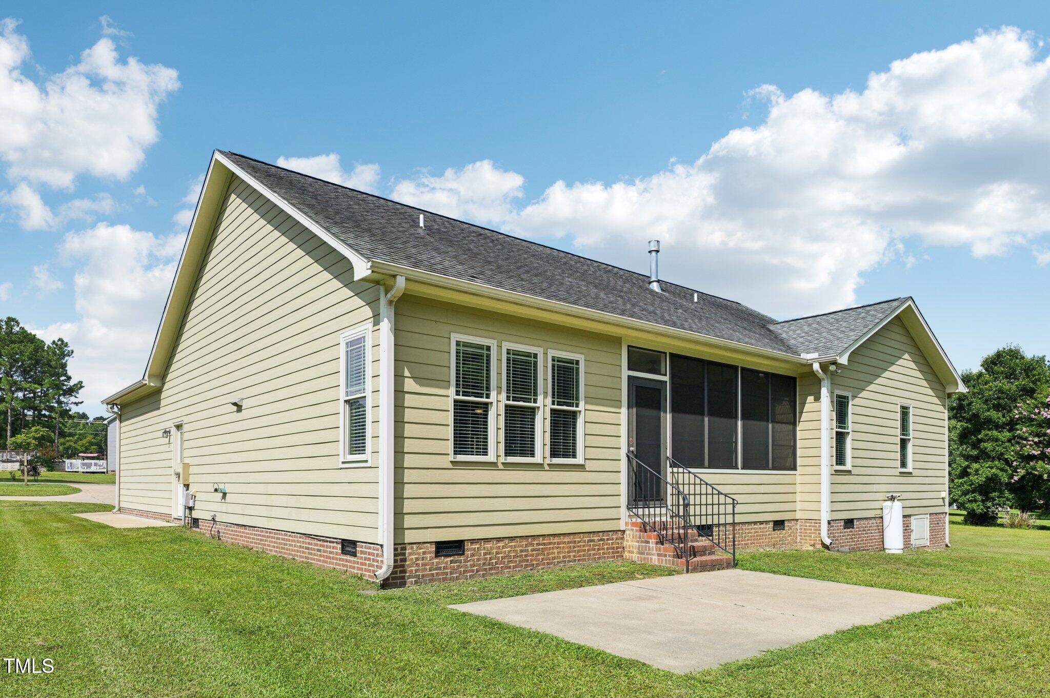 75 Crestline Drive Selma, NC 27576 - Photo 28 of 31 a view of a house with a yard