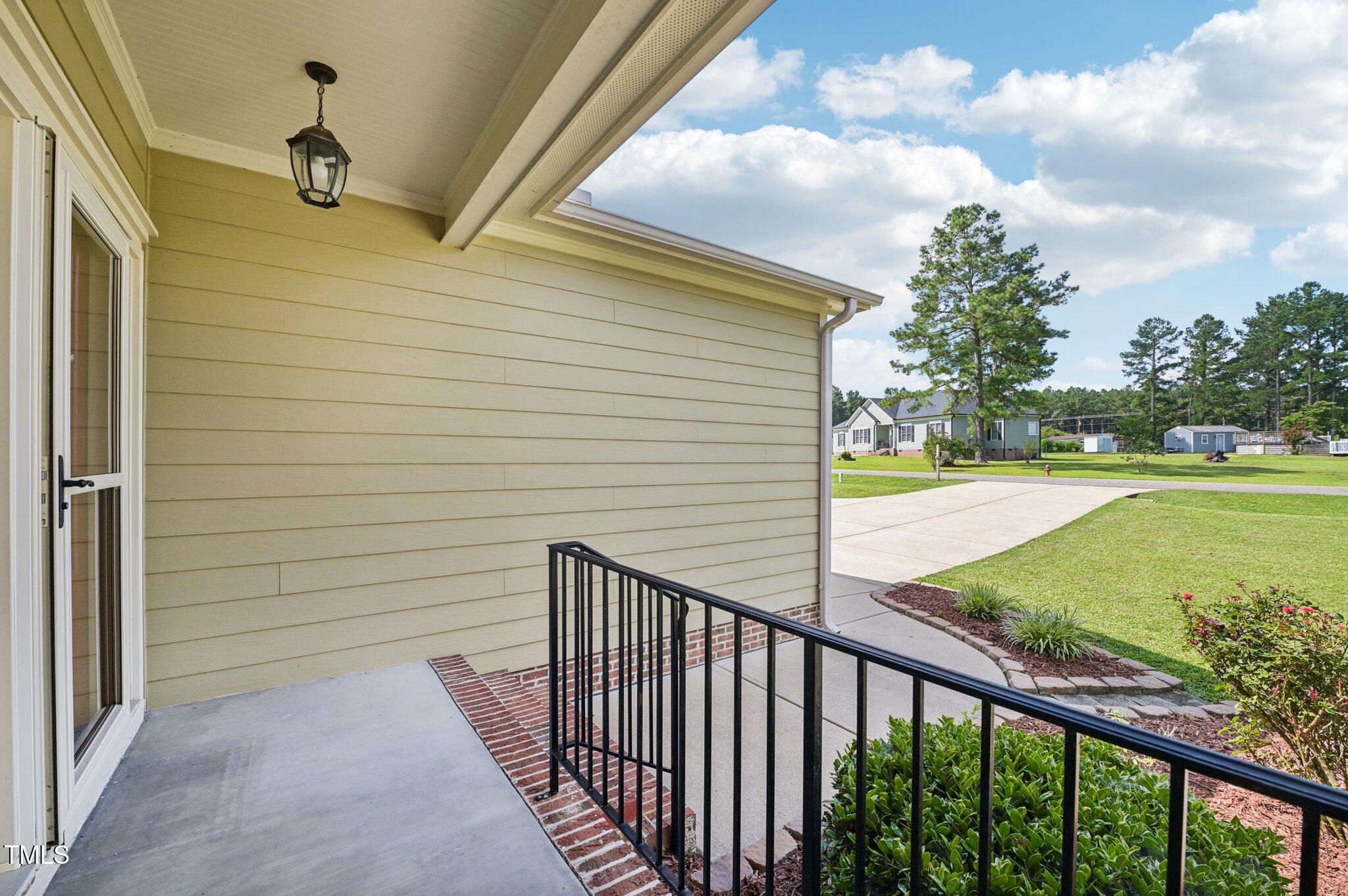 75 Crestline Drive Selma, NC 27576 - Photo 3 of 31 a view of a balcony with an outdoor space